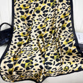 European and American fashion simulation silk long silk scarf, simple and versatile leopard print simulation silk travel vacation shawl